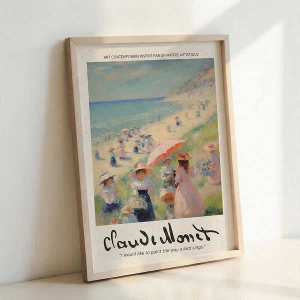 May include: Framed art print showing an Impressionist beach scene with people in period clothing gathered on sandy shore near blue ocean. Features soft, painterly brushstrokes in pastels with figures under parasols and scattered across the beach. Light wood frame sits against white wall casting gentle shadow. Print includes artist signature and quote at bottom.