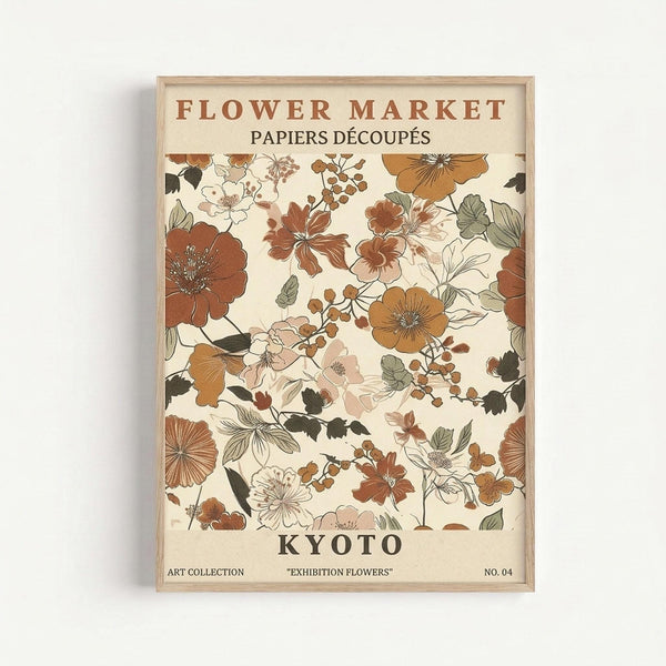 Framed vintage-style botanical art print featuring illustrated flowers and foliage in warm autumn tones of rust, orange, sage green, and cream against an off-white background. The design shows various blooms including poppies, cherry blossoms, and berries with delicate line work and watercolor-style coloring. Text reads "FLOWER MARKET" at top, "PAPIERS DÉCOUPÉS" below, "KYOTO" prominently displayed, and "ART COLLECTION EXHIBITION FLOWERS NO. 04" at bottom. Light wood