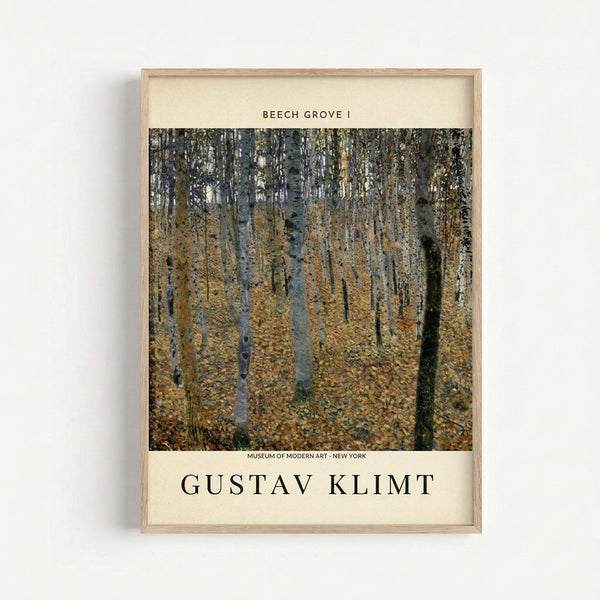 May include: Framed museum poster print of Gustav Klimt's "Beech Grove I" painting hanging on white wall. Light wood frame contains artwork showing dense forest of tall birch trees with white bark and golden autumn foliage covering ground. Print includes title text at top and artist name at bottom on cream background.