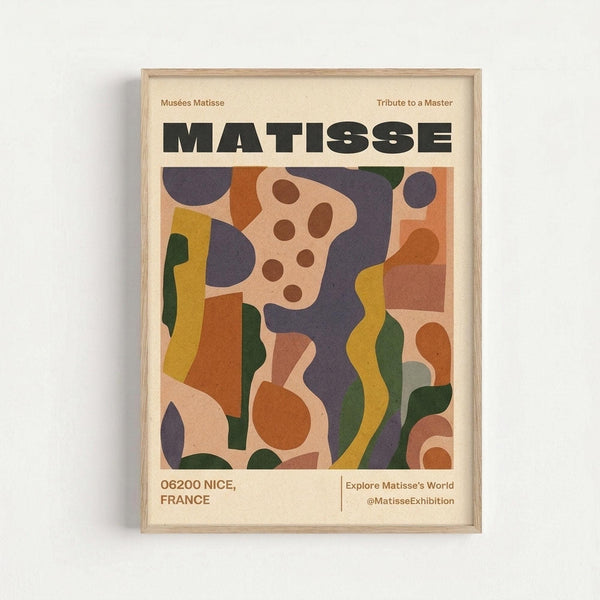 May include: Framed poster print in light wood frame against white wall showing colorful abstract collage artwork with organic shapes in purple, orange, yellow, green, and pink tones. Bold black "MATISSE" text at top with "Musées Matisse" and "Tribute to a Master" in smaller text. Location "06200 NICE, FRANCE" and social media handle visible at bottom on cream background.