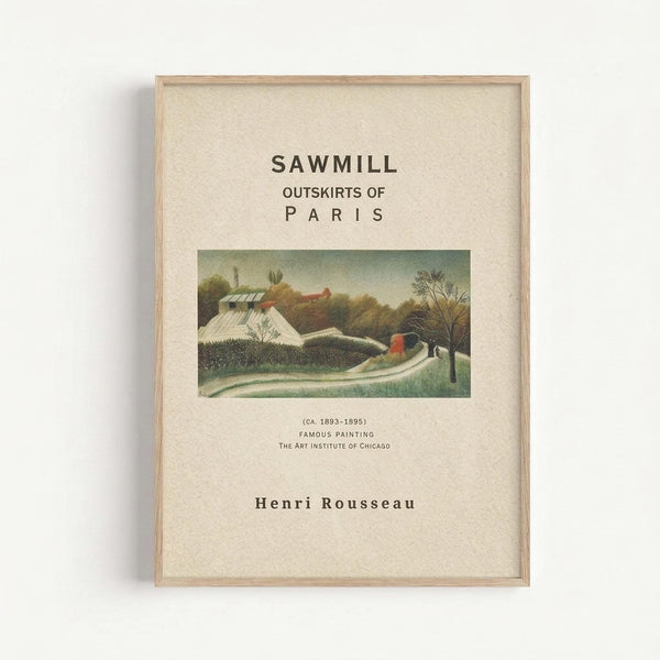 A framed art print featuring Henri Rousseau's "Sawmill, Outskirts of Paris" (ca. 1893-1895) from The Art Institute of Chicago. The painting depicts a rural landscape with white buildings including a sawmill, lush green trees, and rolling hills under a pale sky. The poster has cream-colored background with black text and is displayed in a light wood frame against a white wall.