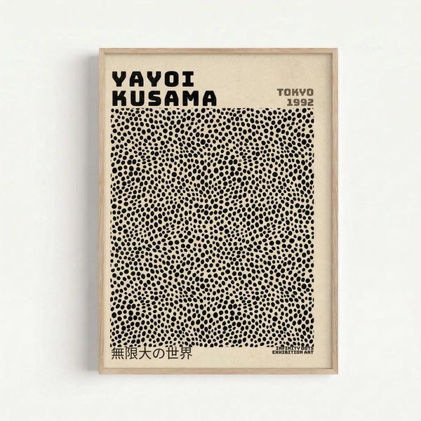 Framed exhibition poster with cream background featuring black polka dot pattern covering most of the design. Bold black text "YAYOI KUSAMA" at top left, "TOKYO 1992" at top right, and Japanese characters at bottom left. Small text "INFINITY DOTS EXHIBITION ART" appears in bottom right corner. Light wood frame mounted on white wall.