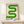 May include: Framed poster with green curved geometric shape resembling flowing ribbons or an S-curve against cream background, displaying "bauhaus 1919" text below. Natural wood frame sits on light wooden surface with small white wrapped gift box decorated with twine and greenery sprig. Neutral wall background creates minimalist styling setup.