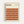 Framed geometric poster with warm autumn colors featuring rows of circles divided into quarters in shades of orange, burgundy, brown, and rust red against a cream background. The minimalist design displays "BAUHAUS" text at top with subtitle about modernism and abstract arts from 1919-1933, plus "School of Architecture" details. Light wood frame hangs on white wall, showing Bauhaus-inspired mathematical pattern with clean lines and earthy color palette.