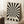 May include: Black and cream optical illusion poster with radiating wavy stripes creating a hypnotic sunburst pattern, displayed in light wood frame leaning against white wall. Small text at bottom reads "BAUHAUS 1919-1933 SCHOOL OF ARTS & CRAFTS". Scene shows cozy corner with white coffee cup on wooden stool and cream knit blanket on textured rug.