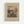 May include: Framed vintage-style art print hanging on white wall showing sepia-toned illustration of hikers climbing mountainous landscape with chalet, trees, and rocky terrain. Features museum-style presentation with beige matting, light wood frame, and text identifying artwork as 1888 piece from The Art Institute of Chicago by Henri Rousseau.