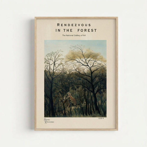 A vintage art reproduction poster in a light wood frame hanging on a white wall. The artwork depicts a dense, mysterious forest scene with intertwining tree branches creating a canopy overhead. Two small figures appear to be meeting in a clearing among the lush green foliage. The painting has an impressionistic style with soft, muted earth tones of green, brown, and cream. Text above reads "RENDEZVOUS IN THE FOREST" and "The National Gallery of Art" with "Henri Rousseau 1889" c