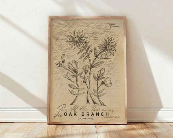 May include: Framed botanical illustration print leaning against white wall on light wooden floor. Aged beige paper features detailed black line drawings of flowering plants with daisy-like blooms and smaller flowers. Cross-hatched shading creates vintage scientific illustration style. Thin wooden frame with natural finish. Soft shadows cast across white fabric background.