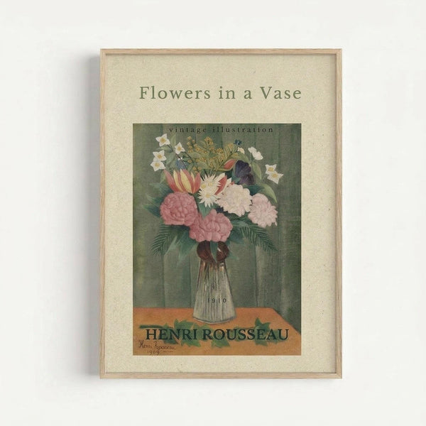 Framed vintage botanical poster showing a floral still life with pink and white flowers including roses and carnations in a clear glass vase. The illustration features muted green background tones with orange table surface. Text reads "Flowers in a Vase vintage illustration" at top and "HENRI ROUSSEAU" at bottom with "1910" and "1909" dates. Light wood frame with cream matting against white wall.