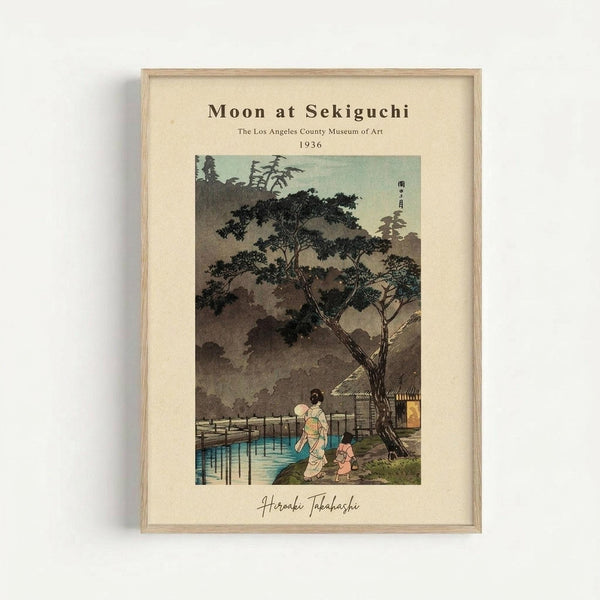 May include: Framed vintage Japanese woodblock print showing two figures in traditional dress walking beside water under a large tree at dusk. The artwork features muted greens, browns, and blues with a pagoda visible in the misty background. Light wooden frame mounted on white wall with museum-style text layout above and below the image.