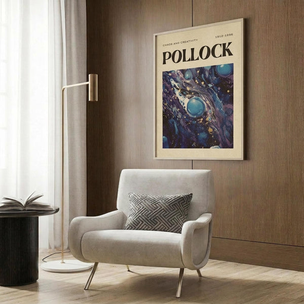 May include: Abstract expressionist artwork poster with swirling blue, purple and white paint strokes creating cosmic-like patterns, displayed in cream mat and frame on wood paneled wall above beige upholstered armchair with geometric patterned pillow, brass floor lamp and dark round side table with open book nearby