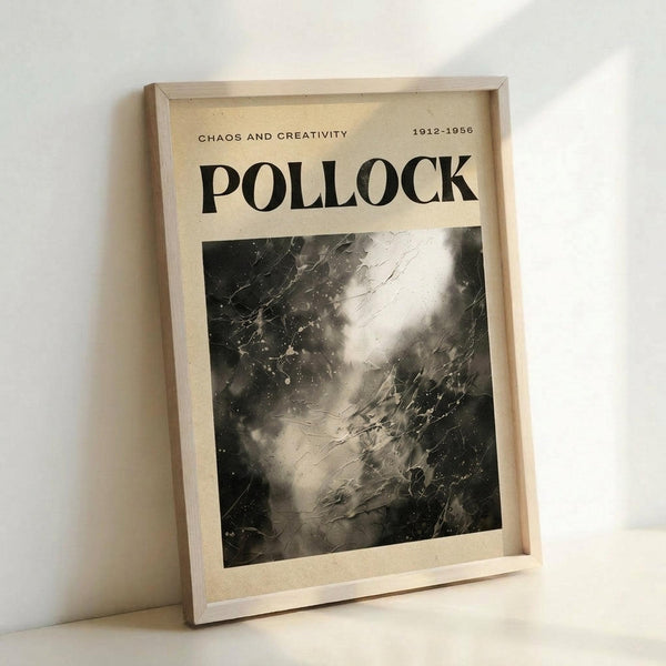 May include: Framed poster print leaning against white wall corner showing Jackson Pollock's abstract expressionist drip painting in black and white. Features chaotic splatters, drips, and gestural marks across canvas with "POLLOCK" in bold black letters above artwork and "CHAOS AND CREATIVITY 1912-1956" text. Light wood frame on cream colored poster with dramatic paint texture details visible.