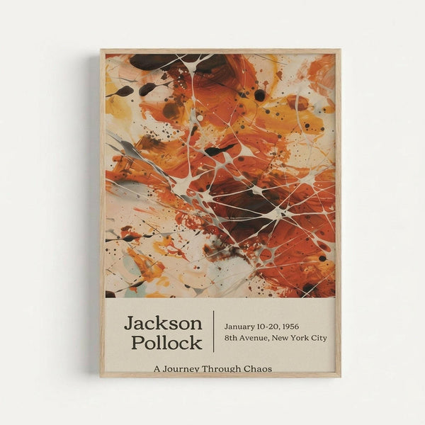 Abstract expressionist artwork featuring energetic splashes and drips of orange, red, black and white paint with thin white lines creating a web-like pattern across the composition. Below the artwork is text reading "Jackson Pollock" with exhibition details "January 10-20, 1956 8th Avenue, New York City" and "A Journey Through Chaos." The poster is displayed in a light wooden frame against a white wall.