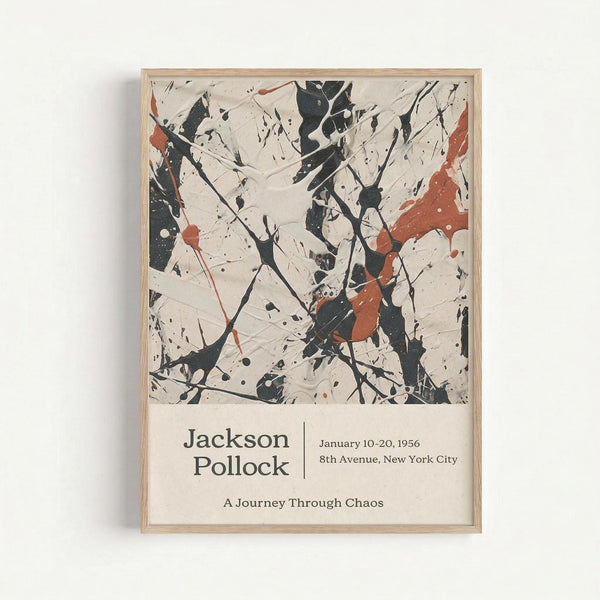Framed abstract art poster with chaotic black paint splatters and drips on cream background, accented with rust-colored splashes. Features thin black crossing lines throughout the composition. Text below reads "Jackson Pollock" with exhibition details "January 10-20, 1956, 8th Avenue, New York City" and subtitle "A Journey Through Chaos". Light wood frame against white wall.
