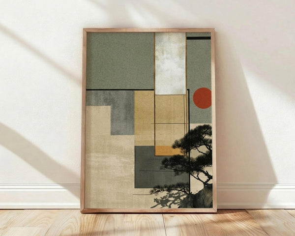 May include: Framed abstract geometric artwork featuring sage green and cream rectangular blocks with silhouette of black pine tree in foreground and orange circle accent, displayed against white textured wall on light wood floor with diagonal shadows