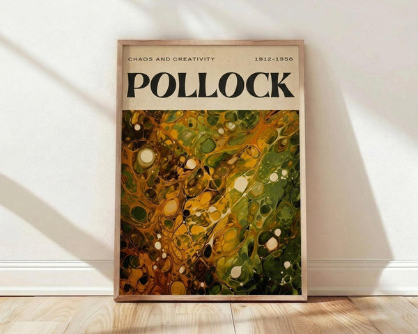 May include: Framed abstract expressionist artwork with swirling patterns of golden yellow, olive green, and brown paint with scattered white circular forms, displayed in light wood frame against white wall on wooden floor with natural sunlight casting diagonal shadows across the scene.