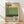May include: Framed poster print with vintage-inspired design featuring horizontal color blocks in cream, yellow, and green tones. Large black serif text displays "Mark Rothko" with birth and death dates "09.1903 02.1970". Includes descriptive paragraph about the artist's work with colors and emotion. Natural wood frame sits against white wall on light wooden floor with soft shadows.