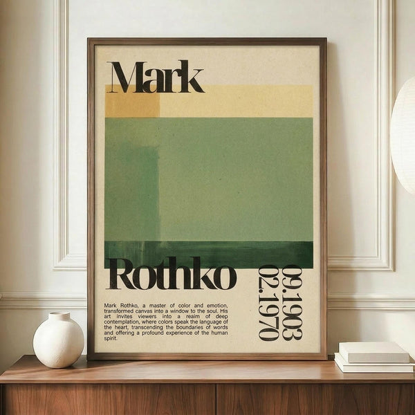 May include: A framed poster featuring abstract color blocks in cream, yellow, and green tones with "Mark Rothko" text and biographical information, displayed on a wooden sideboard next to a white ceramic vase and books in an elegant room with white paneled walls.