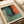 an abstract painting with a mix of blue, orange, and green colors.