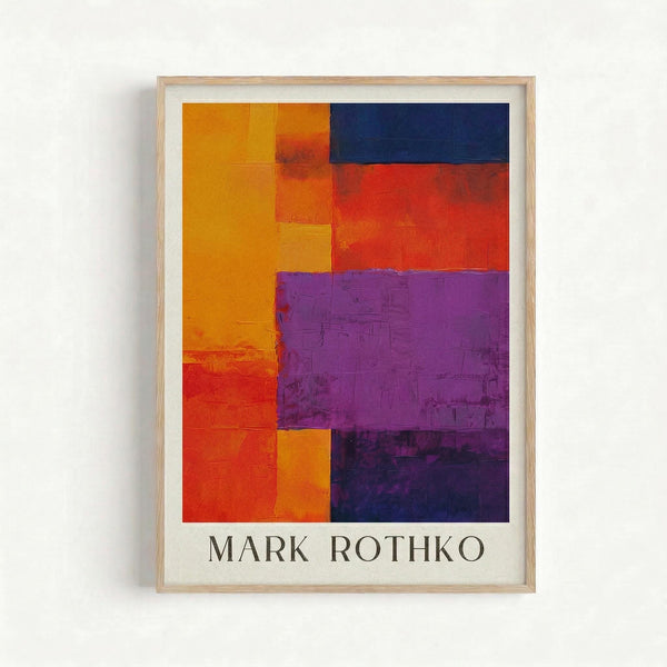 May include: Framed abstract art print with bold geometric color blocks in orange, red, purple, and navy blue arranged in rectangular sections. The artwork shows painterly textures and color field style composition. Light wood frame with white matting hangs on plain white wall. Artist name "MARK ROTHKO" printed below the colorful abstract design.