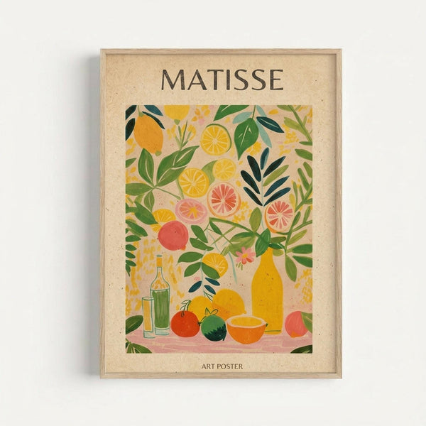 May include: Framed art poster in light wood frame mounted on white wall, featuring colorful still life illustration with citrus fruits, leafy plants, bottles and bowls in Matisse-inspired style using yellow, green, pink and orange tones on cream background with "MATISSE" and "ART POSTER" text