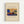 May include: Framed museum poster print mounted on white wall, featuring Wassily Kandinsky's colorful abstract painting with bold blue, yellow, red and green brushstrokes. Cream-colored background with elegant script title "Painting with Troika" and "The Art Institute of Chicago" text. Light wood frame with clean minimal styling against neutral backdrop.