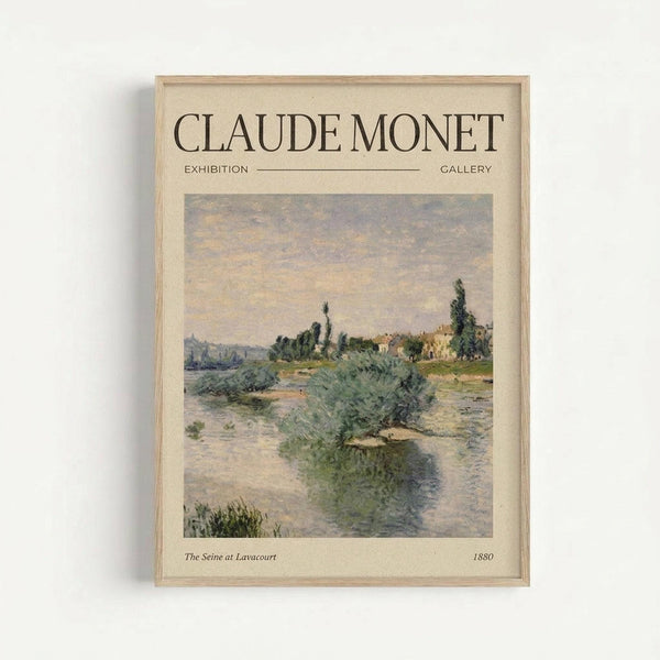 May include: Framed art print hanging on white wall showing impressionist landscape painting of river scene with green vegetation along banks, buildings in distance under cloudy sky in soft blues, greens and earth tones. Light wood frame with cream matting, exhibition-style presentation with artist name at top.