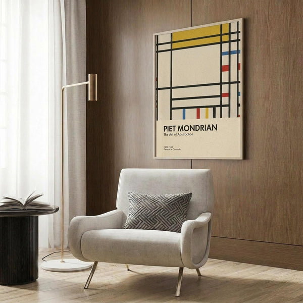 May include: Piet Mondrian exhibition poster with geometric black grid lines and colorful rectangles in yellow, red, and blue on cream background, displayed in modern living room with beige armchair, geometric patterned pillow, brass floor lamp, and wood-paneled wall
