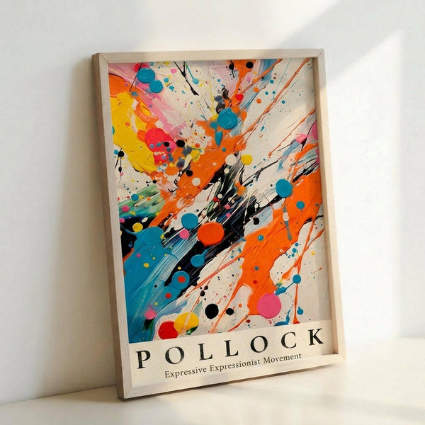 May include: Framed abstract expressionist style poster with vibrant paint splatters and drips in orange, blue, yellow, pink, and black against white background. Features dynamic brushstrokes and color bursts radiating from center. Text reads "POLLOCK Expressive Expressionist Movement" at bottom. Light wooden frame leans against white wall, showing natural lighting and shadows.
