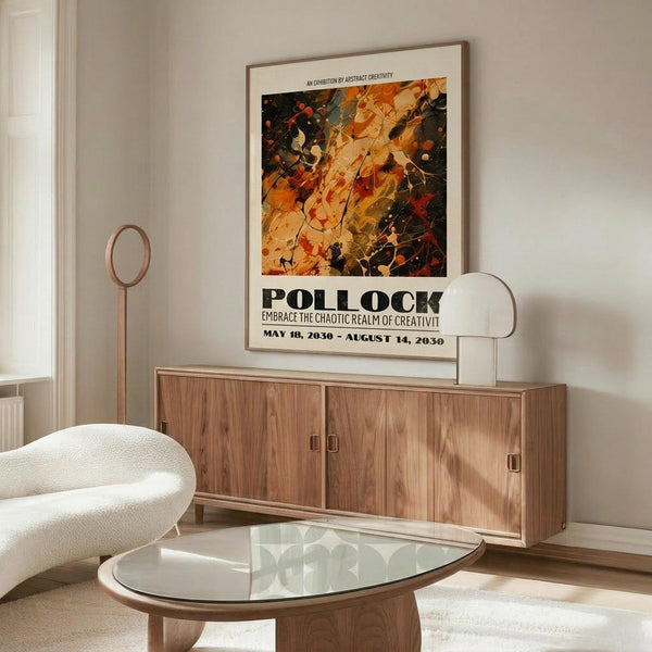May include: Abstract art poster with Jackson Pollock-style paint splatters in orange, yellow, black and red tones, displayed in thin wooden frame above mid-century modern walnut credenza. Room features white curved chair, oval glass coffee table, brass floor lamp, and minimalist decor in neutral tones with natural lighting.