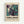 May include: Framed exhibition poster with abstract marbled artwork in swirling teal, purple, cream and black colors resembling fluid paint patterns. Poster displays "POLLOCK" in bold black letters with subtitle text and exhibition dates. Light wooden frame against white wall background.