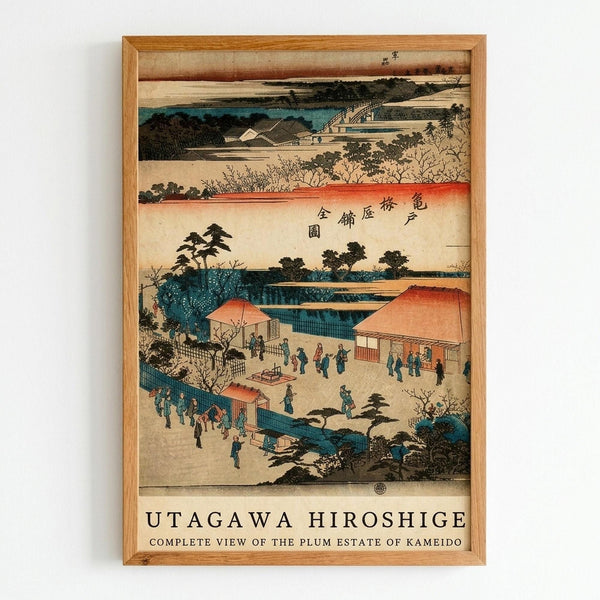 Japanese woodblock print in natural wood frame showing aerial view of traditional estate with orange-roofed buildings, small figures in blue robes gathering in courtyards, turquoise water features, and lush green trees. The vintage artwork features muted earth tones with Japanese text at top, title text below reading "Utagawa Hiroshige Complete View of the Plum Estate of Kameido" against cream background.
