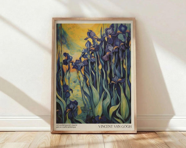 May include: A framed Van Gogh-style poster featuring purple irises with flowing green stems against a golden yellow background, displayed in a light wood frame on wooden flooring against a white wall with natural sunlight casting diagonal shadows across the scene.