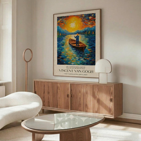 May include: A framed poster showing a figure in a boat on water beneath a swirling sun and sky in Van Gogh's distinctive style, displayed above a walnut wood credenza in a modern living room with cream walls, white upholstered chair, glass coffee table, and brass floor lamp.