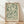 May include: Framed botanical art print leaning against white wall on light wood floor with natural shadows. Features green leaves and stems in William Morris style on cream background with thin wood frame. Exhibition-style poster with text at bottom.