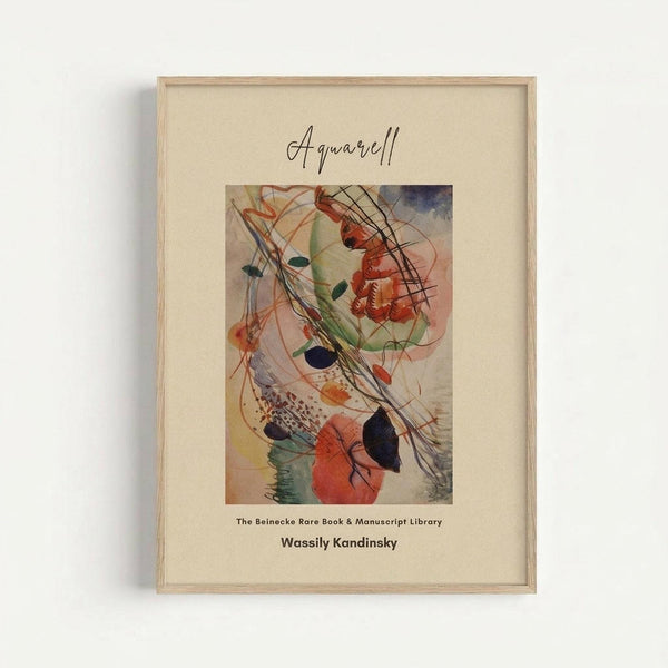 Framed abstract watercolor art print featuring flowing organic shapes in vibrant reds, greens, and blues with dynamic black lines and circular forms. The artwork is displayed in a light wood frame with cream matting against a white wall. Text below the image reads "Aquarell" at top, "The Beinecke Rare Book & Manuscript Library" in center, and "Wassily Kandinsky" at bottom in clean typography.