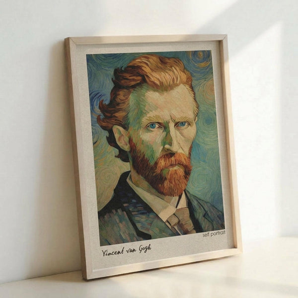 May include: Framed poster print of a self-portrait showing a man with reddish-brown hair and beard, blue eyes, wearing a dark jacket with white collar. The artwork features swirling brushstrokes in blues and greens typical of post-impressionist style. Natural wood frame with white matting displays the print, which includes "Vincent van Gogh" and "self portrait" text below the image. Frame leans against white wall on light surface.