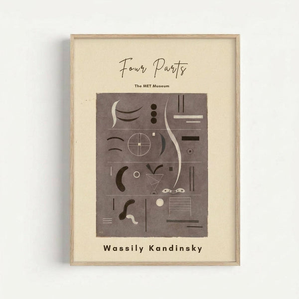 May include: Framed art print displaying abstract geometric shapes and forms in muted brown and beige tones, arranged in a grid-like composition. The minimalist poster features curved lines, circles, triangles, and various geometric elements against a neutral background. Text reads "Four Parts" and "The MET Museum" above the artwork, with "Wassily Kandinsky" below. The piece is shown in a light wood frame hanging on a white wall.