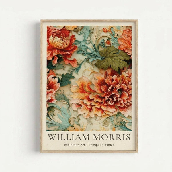 A framed botanical art print featuring ornate floral designs with large blooming flowers in warm coral, orange and red tones alongside decorative leaves in sage green and teal. The vintage-inspired artwork has flowing, ornamental patterns with layered petals and curving foliage against a cream background. Below the botanical illustration is text reading "WILLIAM MORRIS" and "Exhibition Art - Tranquil Botanics" in dark lettering. The print is displayed in a light wood frame against a whit