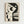 May include: Framed abstract geometric artwork hanging on white wall, featuring stylized woman's profile in black and cream tones with circular and curved shapes, displayed in light wood frame