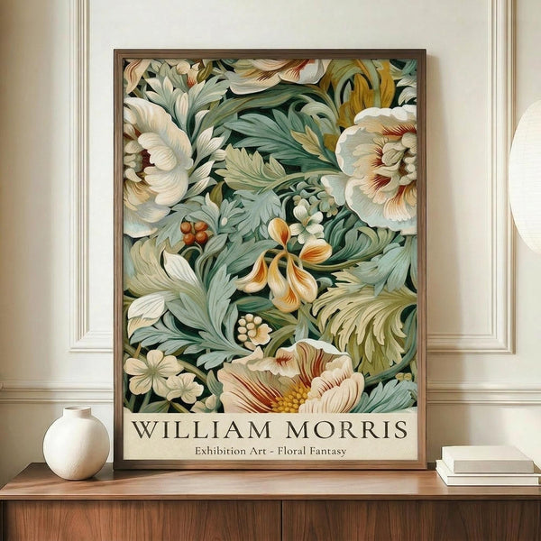 May include: Framed botanical art print featuring lush floral design with cream peonies, green foliage, and orange berries in William Morris decorative style, displayed on wooden sideboard beside white ceramic vase and stacked books against cream wainscoted wall