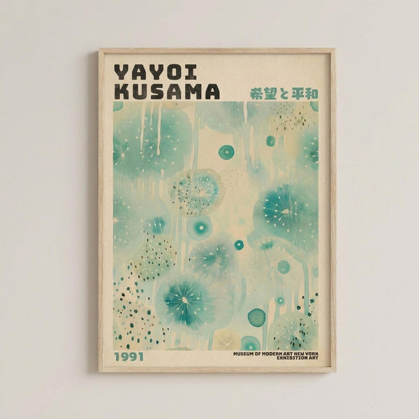 May include: Framed museum exhibition poster featuring abstract organic shapes in soft turquoise and teal tones against cream background. Design shows dotted patterns, radiating burst forms, and flowing circular elements. Text displays "YAYOI KUSAMA" in bold black letters with Japanese characters, "1991" date, and "MUSEUM OF MODERN ART NEW YORK EXHIBITION ART" at bottom. Light wood frame hangs on white wall.