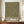 May include: Framed poster with olive green background covered in scattered cream and white dots of varying sizes, displayed on wooden sideboard. Black text at bottom reads "YAYOI KUSAMA" with Japanese characters and "TOKYO". White ceramic vase and stacked books sit nearby against cream wainscoted wall.