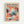 Colorful abstract art poster with polka dot patterns in orange, blue, black and coral tones, featuring flowing organic shapes and wave-like elements at bottom. Bold black text at top reads "YAYOI KUSAMA" with Japanese characters below. Small text indicates Museum of Modern Art New York exhibition. Displayed in light wooden frame against white wall.