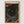 May include: Framed poster with abstract cosmic design featuring swirling flowing forms in blues and teals surrounding a dark starry center with white moon. Scattered colorful polka dots in orange, red, and yellow throughout black background. Japanese text visible at top. Natural wood frame mounted on white wall.