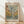 May include: Framed poster with abstract tree design featuring colorful circles and dots in earth tones - blues, greens, browns, and yellows. The artwork shows a stylized tree with branching patterns and polka dot elements against a textured background. Text at top reads "Musee d'Art Moderne de la Ville de Paris" and "Yayoi Kusama" at bottom. Natural wood frame sits on light wooden floor against white wall with soft natural lighting.