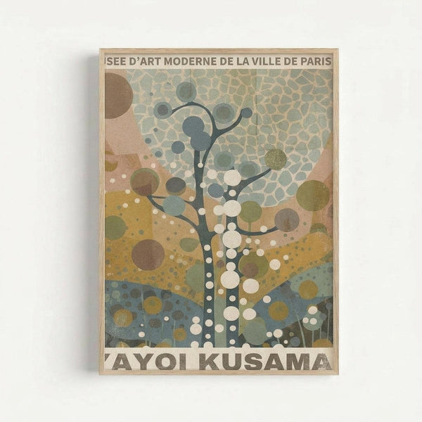 Framed art print featuring an abstract tree design in muted earth tones including sage green, ochre yellow, dusty blue, and cream. The stylized tree has a dark trunk with dotted pattern and circular foliage elements of varying sizes creating a polka dot effect. Text at top reads "MUSEE D'ART MODERNE DE LA VILLE DE PARIS" and bottom shows "YAYOI KUSAMA" in large letters. The artwork combines geometric patterns with organic tree forms in a mid-century modern aesthetic, displayed in a l