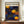 May include: Framed art poster with blue background and orange polka dot patterns, featuring three circular spiral designs in yellow and orange. Japanese text visible at top. Displayed on wooden sideboard next to white ceramic vase and stacked books against cream colored wall with white trim molding.