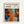 A framed art print featuring vibrant abstract patterns in the style of Japanese contemporary art. The artwork displays colorful organic shapes including polka-dotted forms in yellow and orange, coral-like textures in red, blue dotted areas, and white circular patterns against a black background. The top portion shows "YAYOI KUSAMA" in black text with red Japanese characters and "JAPAN 1987" below. The print is displayed in a light wood frame against a white wall.