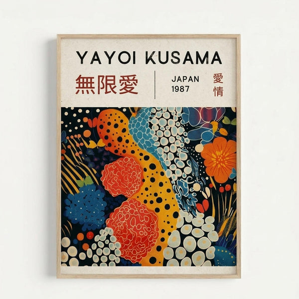 A framed art print featuring vibrant abstract patterns in the style of Japanese contemporary art. The artwork displays colorful organic shapes including polka-dotted forms in yellow and orange, coral-like textures in red, blue dotted areas, and white circular patterns against a black background. The top portion shows "YAYOI KUSAMA" in black text with red Japanese characters and "JAPAN 1987" below. The print is displayed in a light wood frame against a white wall.